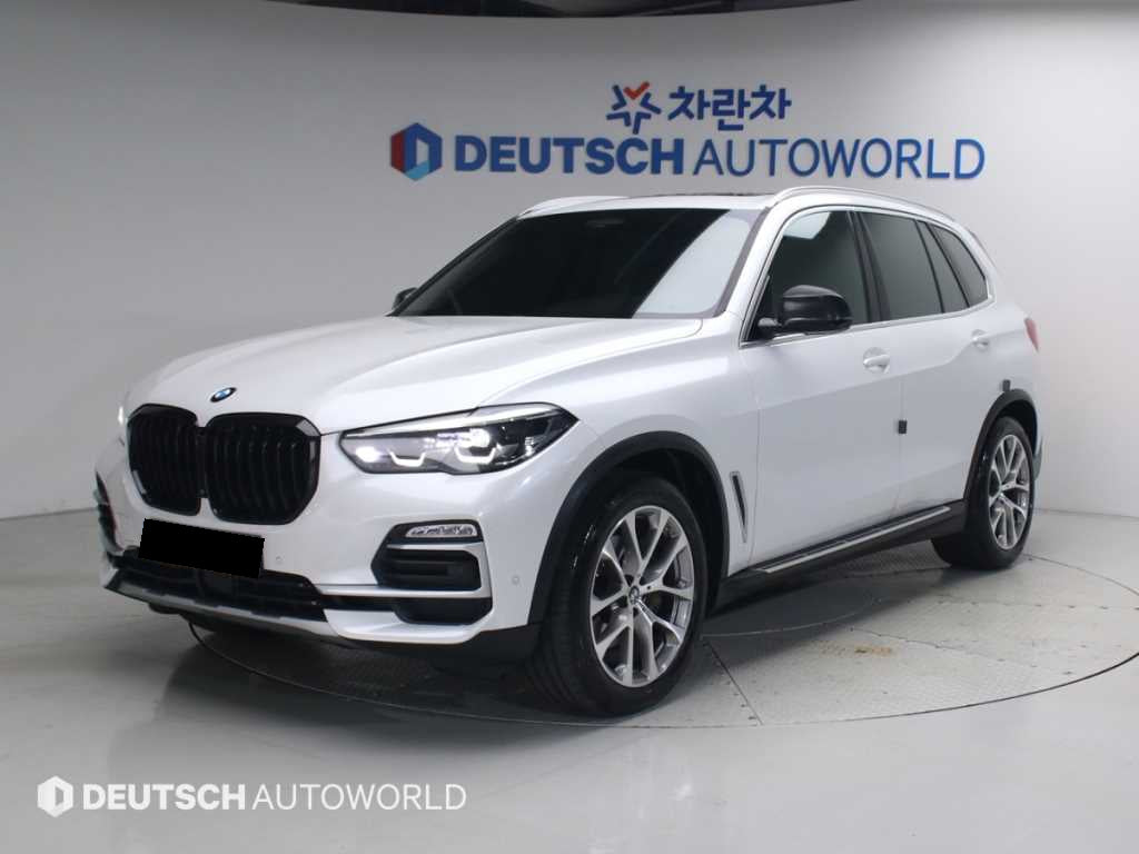 BMW X5 — photo 01