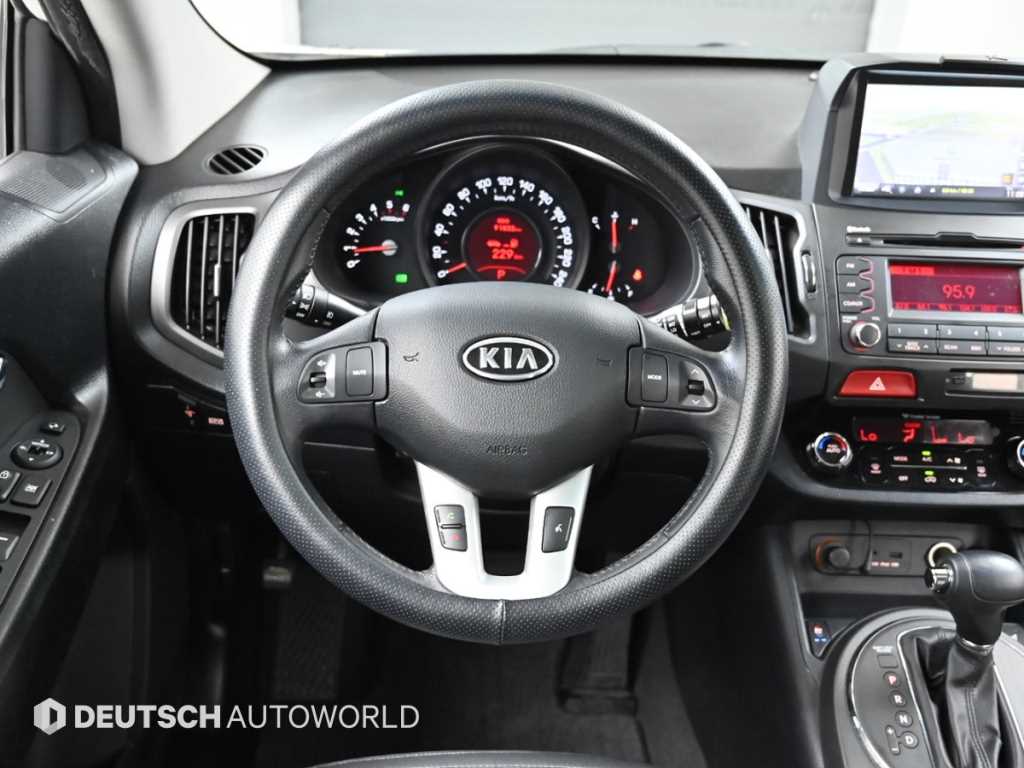 Kia Sportage — photo 13