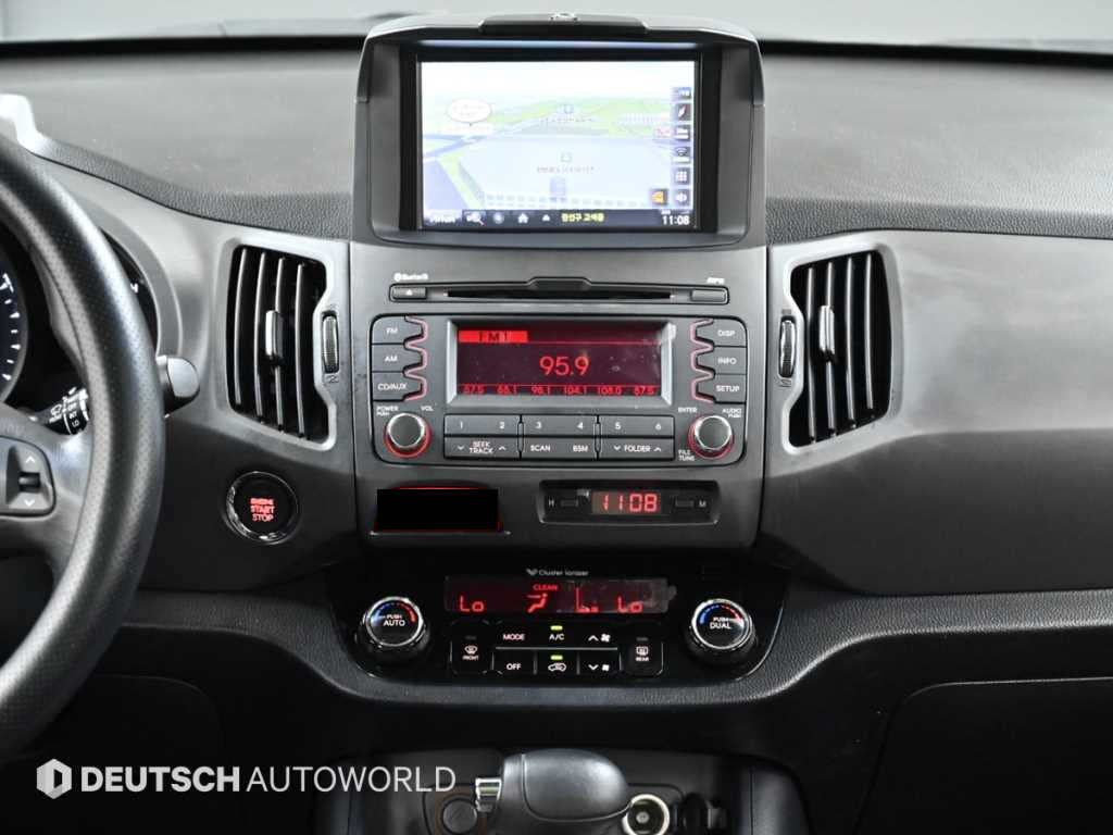 Kia Sportage — photo 14