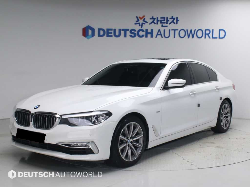 BMW 5-Series — photo 01