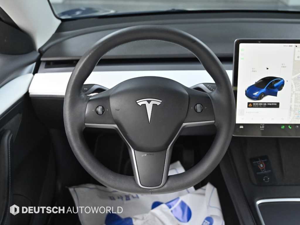 Tesla Model 3 — photo 13