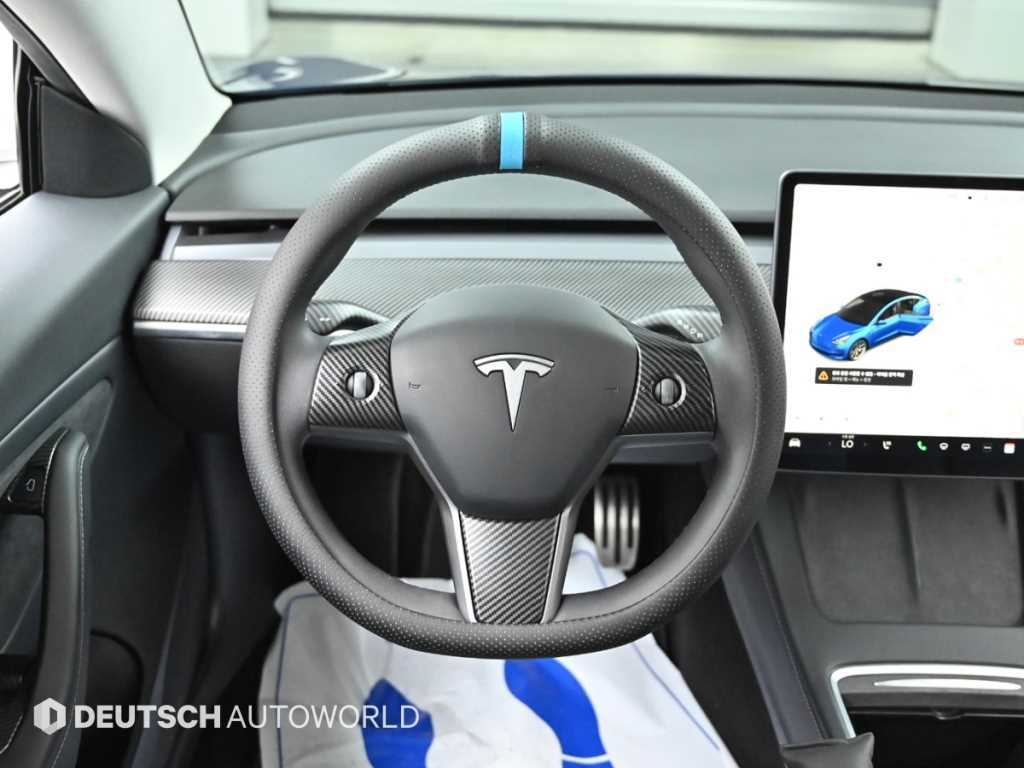 Tesla Model 3 — photo 13