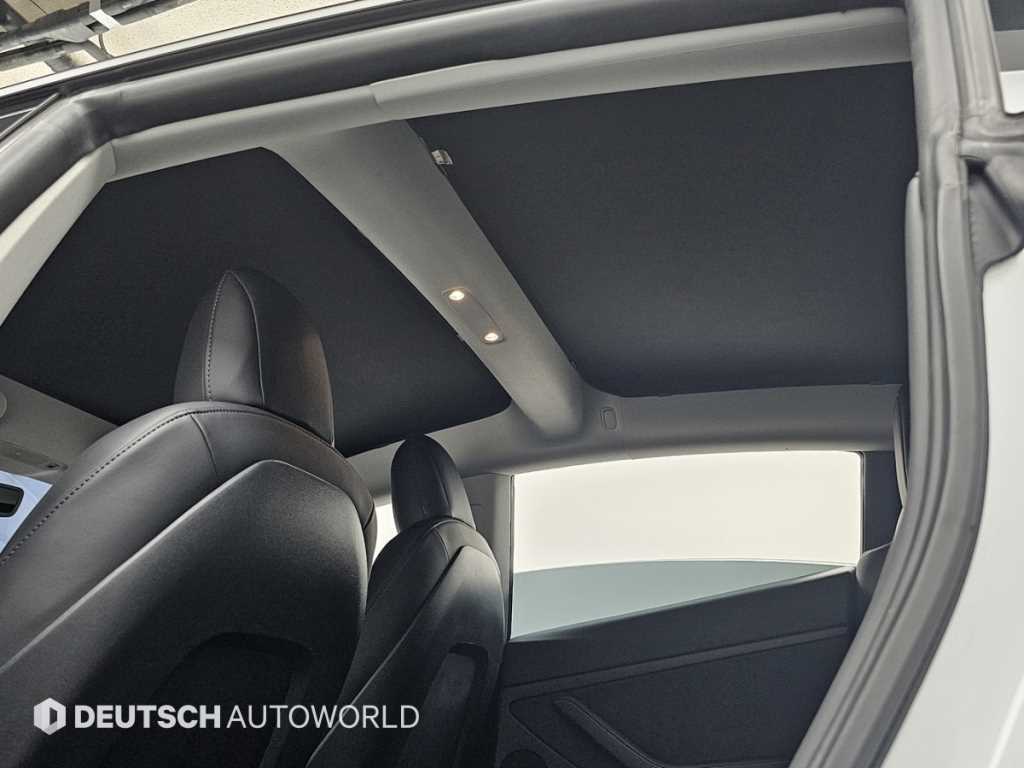 Tesla Model 3 — photo 18