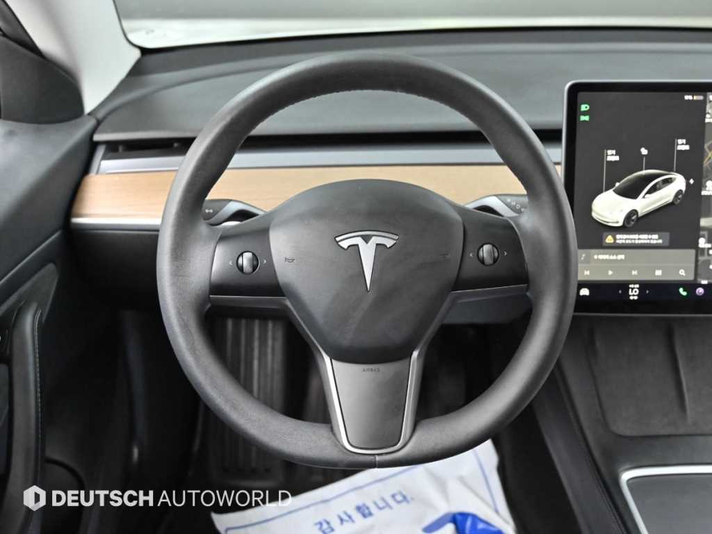 Tesla Model 3 — photo 13