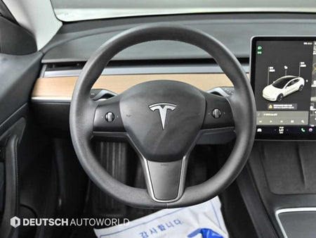 Tesla Model 3 — photo 13