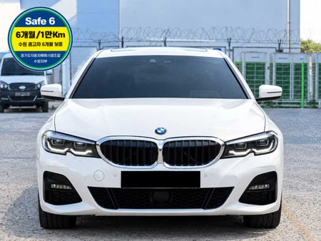 BMW 3-Series — photo 01