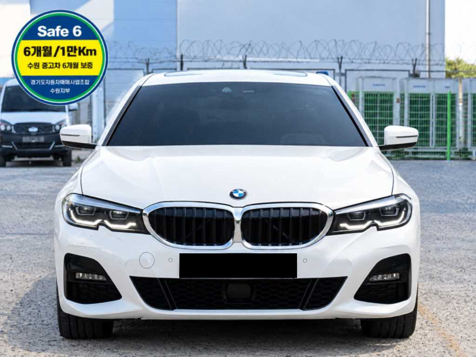 BMW 3-Series — photo 01
