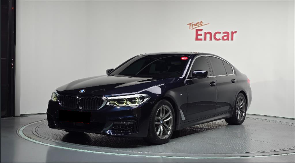 BMW 5-Series — photo 01