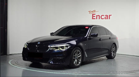 BMW 5-Series — photo 01