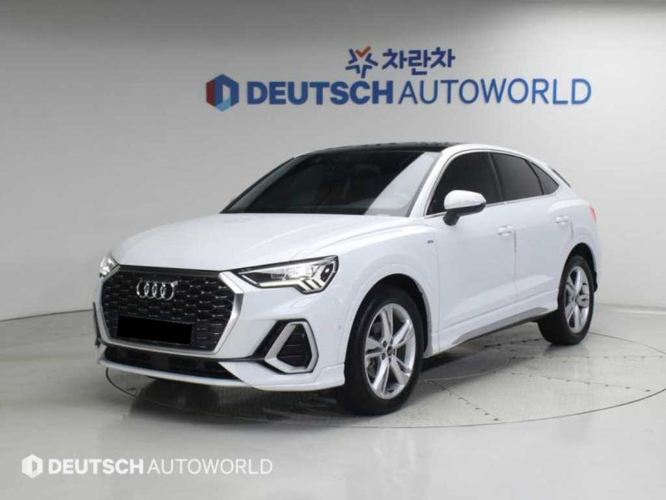 Audi Q3 — photo 01