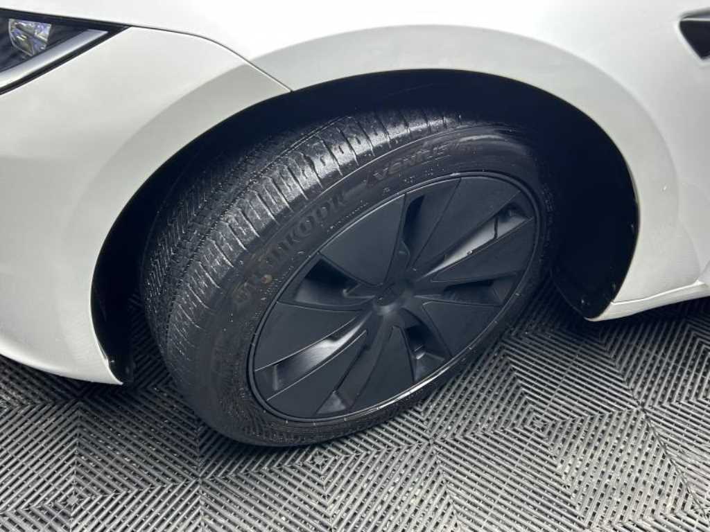 Tesla Model 3 — photo 18