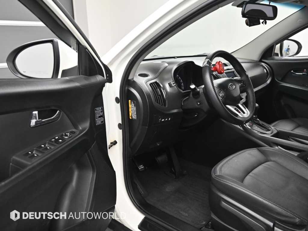 Kia Sportage — photo 11