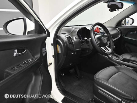 Kia Sportage — photo 11