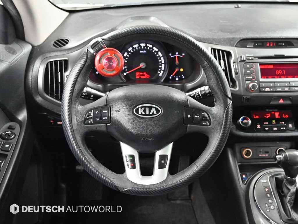 Kia Sportage — photo 13