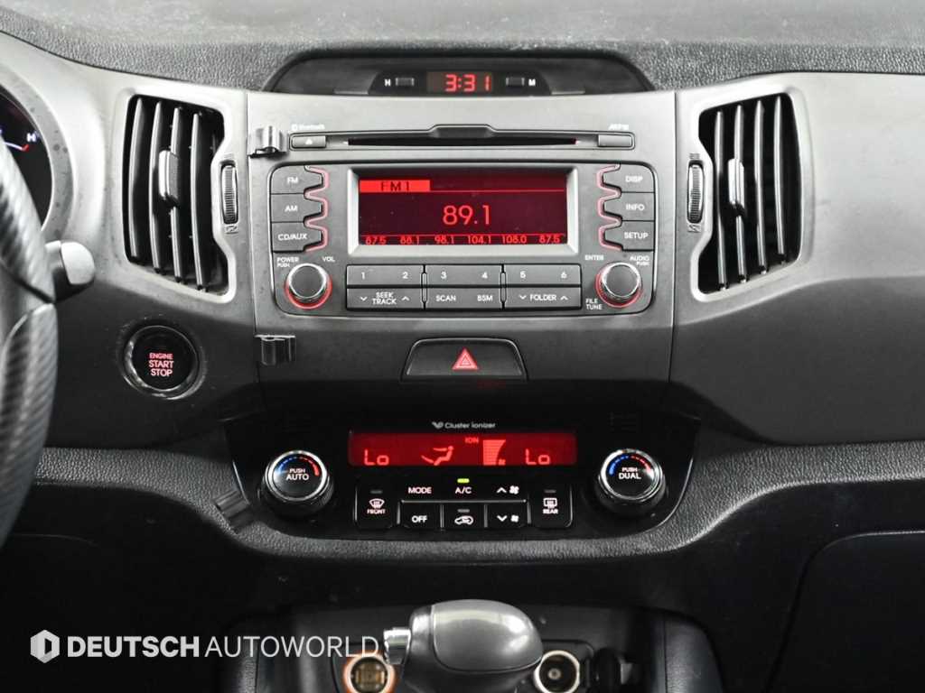 Kia Sportage — photo 14