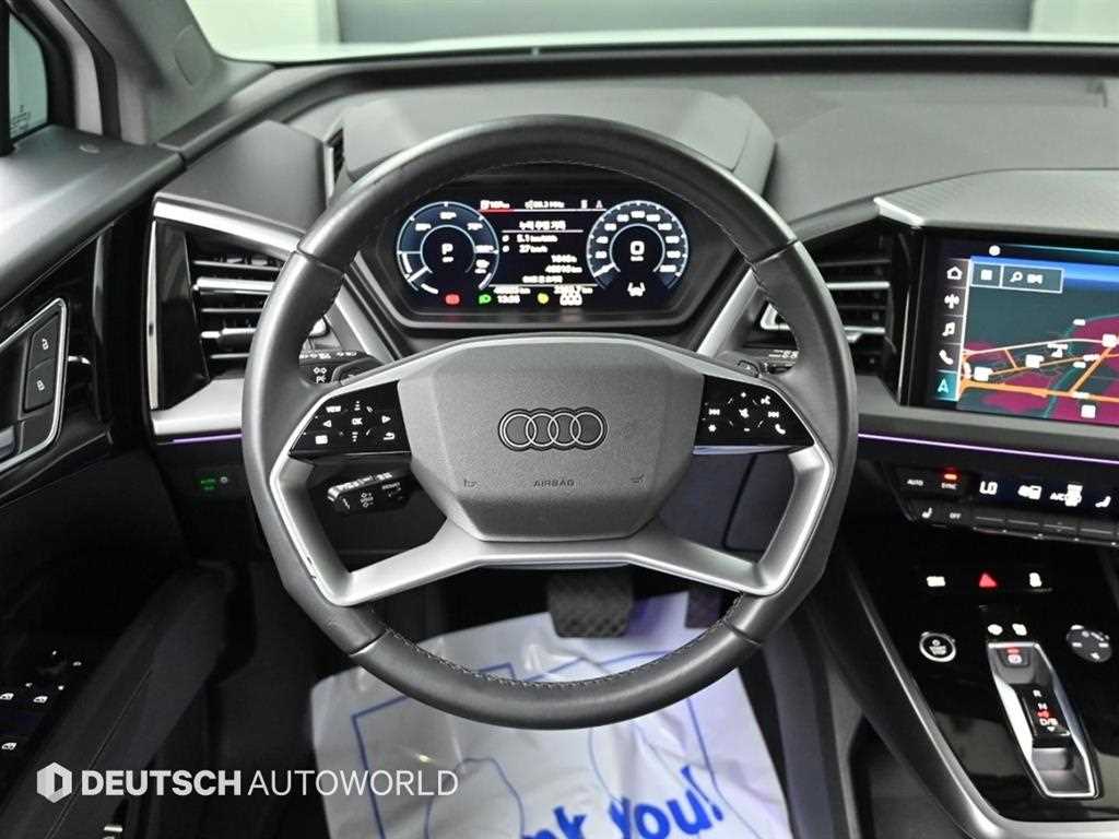 Audi Q4 e-tron — photo 13