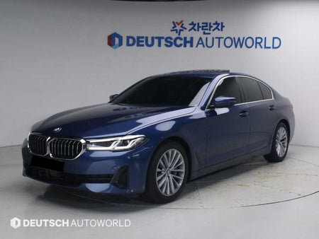 BMW 5-Series — photo 01