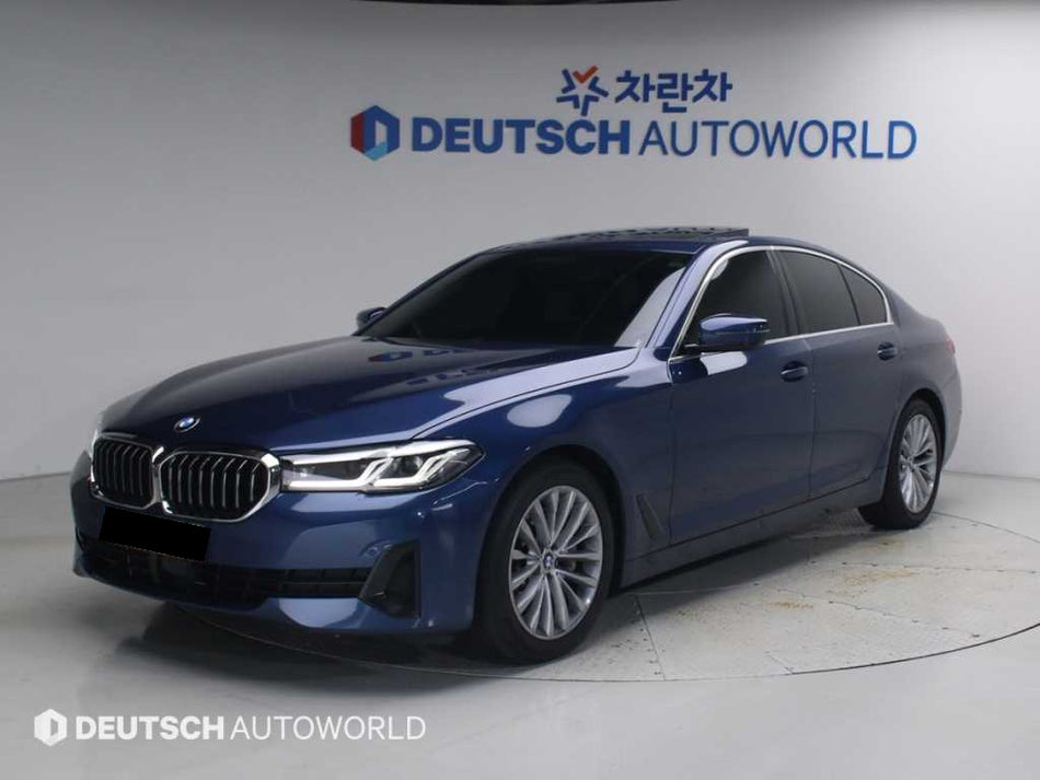 BMW 5-Series — photo 01
