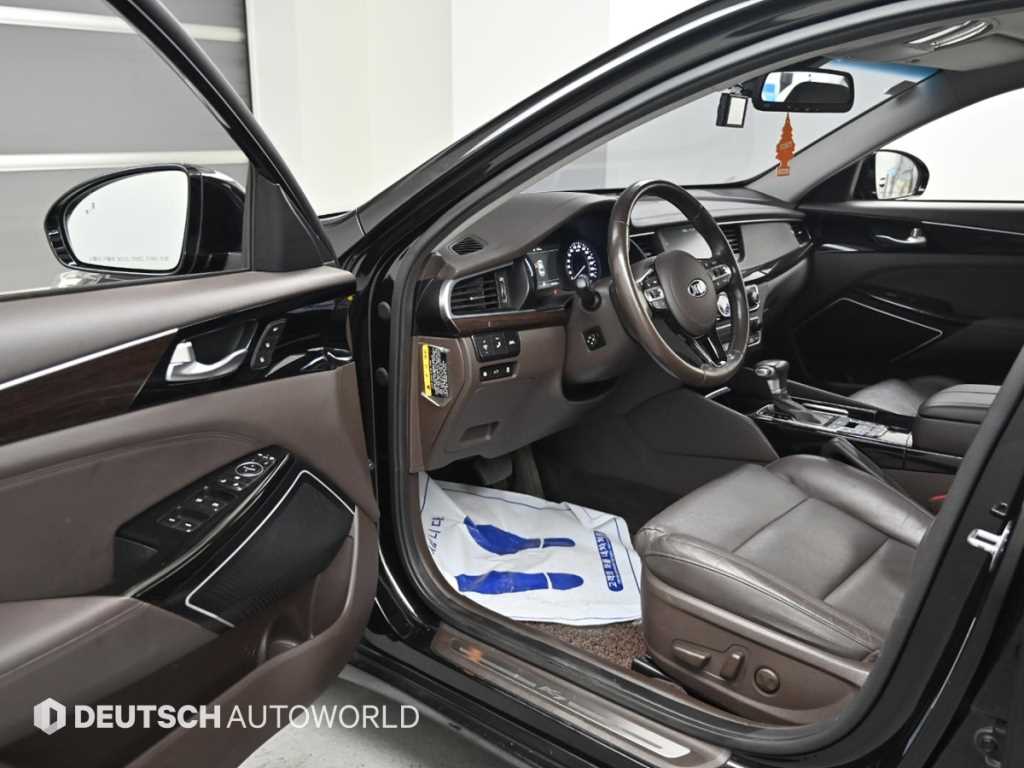Kia K7 — photo 11