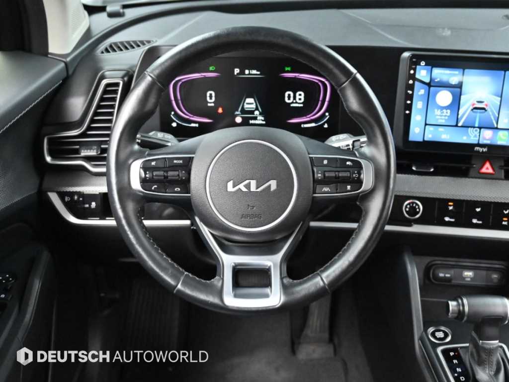 Kia Sportage — photo 14