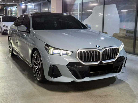 BMW 5-Series — photo 01