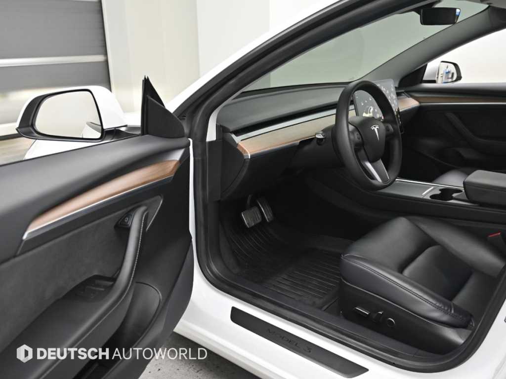 Tesla Model 3 — photo 11