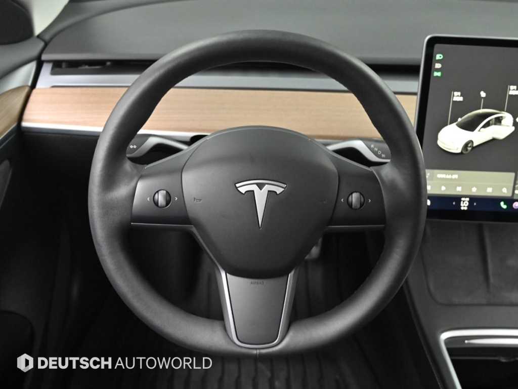 Tesla Model 3 — photo 13