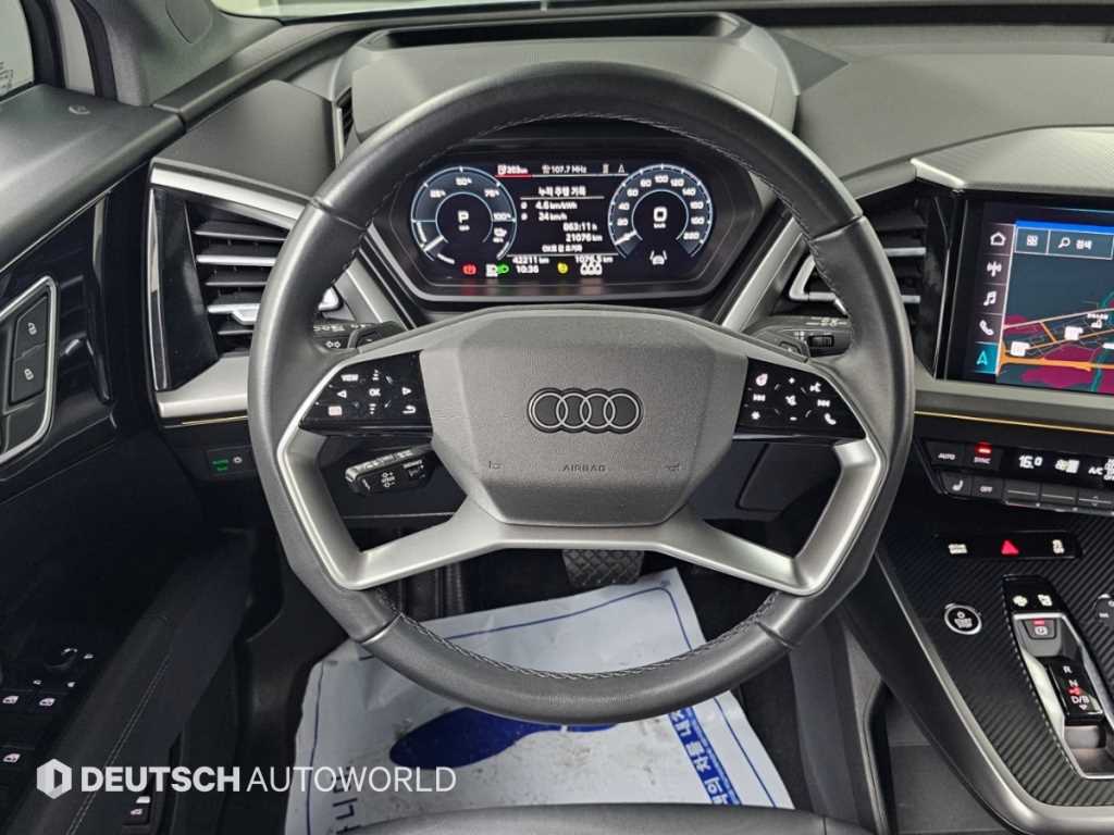 Audi Q4 e-tron — photo 13