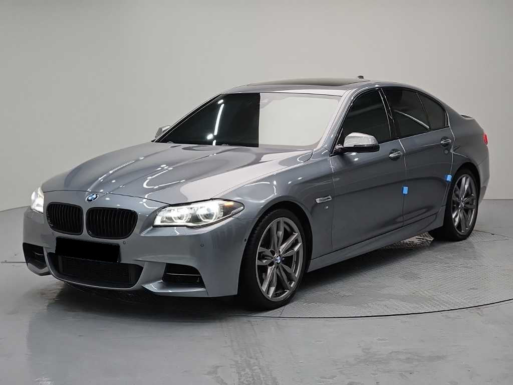 BMW 5-Series — photo 01