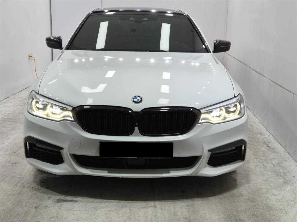 BMW 5-Series — photo 01