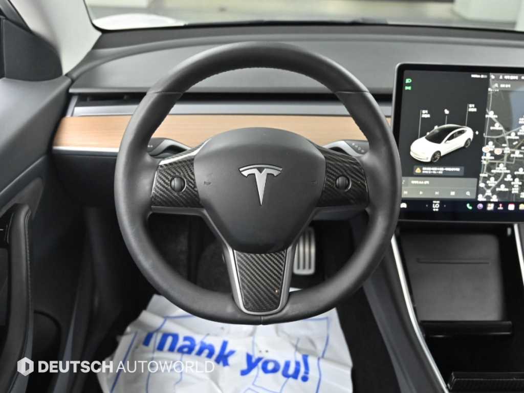 Tesla Model 3 — photo 13