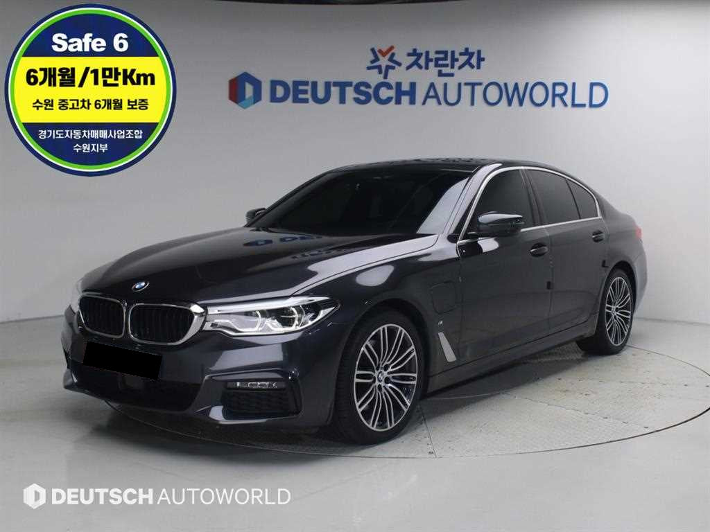 BMW 5-Series — photo 01