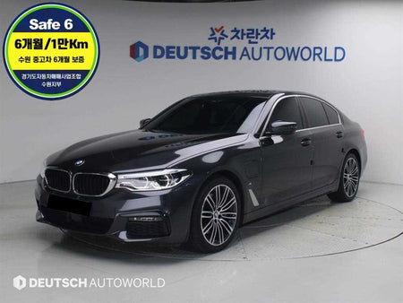 BMW 5-Series — photo 01