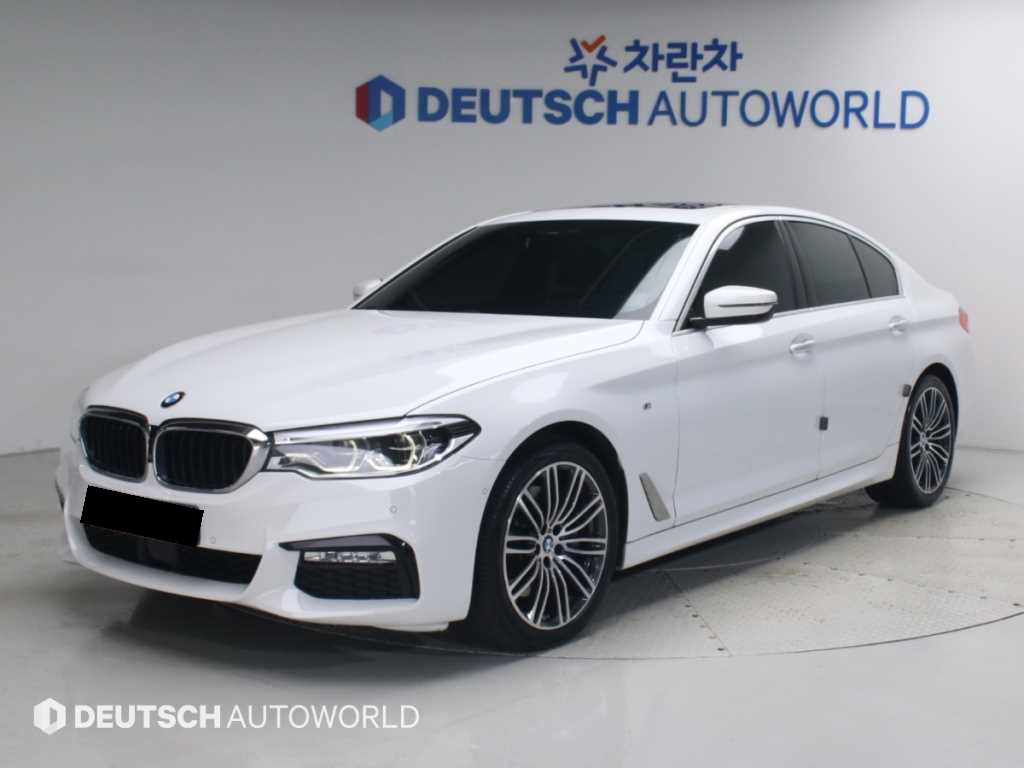 BMW 5-Series — photo 01