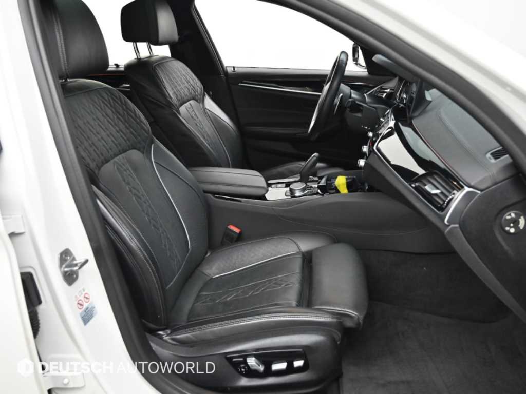 BMW 5-Series — photo 10