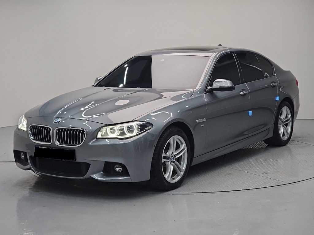 BMW 5-Series — photo 01
