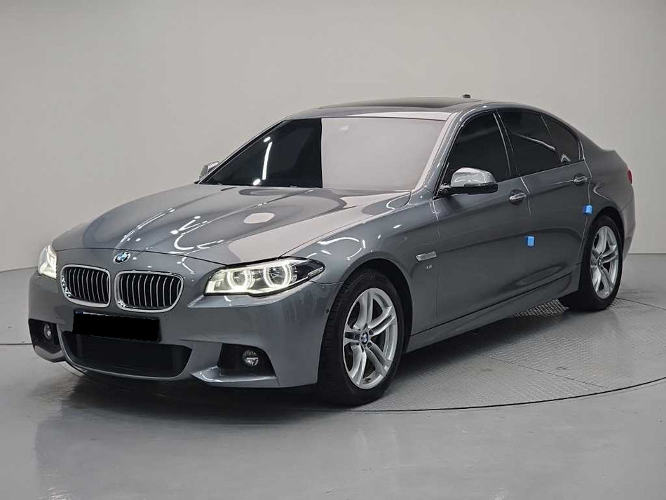 BMW 5-Series — photo 01