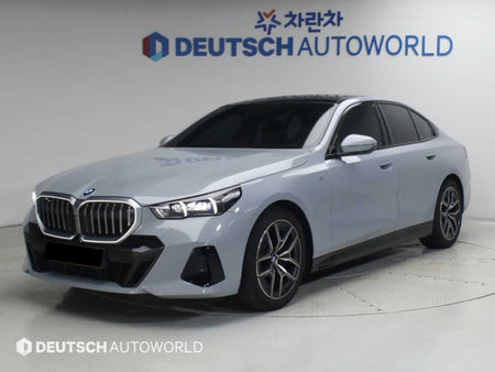 BMW 5-Series — photo 01