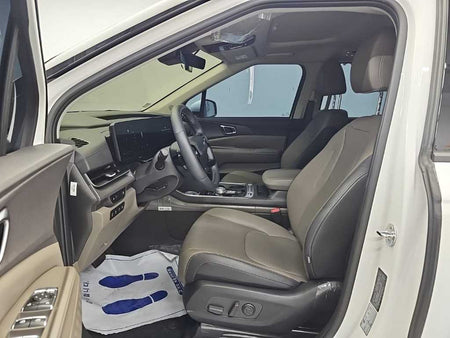Kia Carnival — photo 11