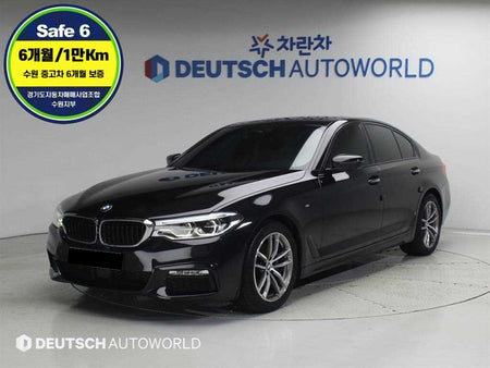 BMW 5-Series — photo 01