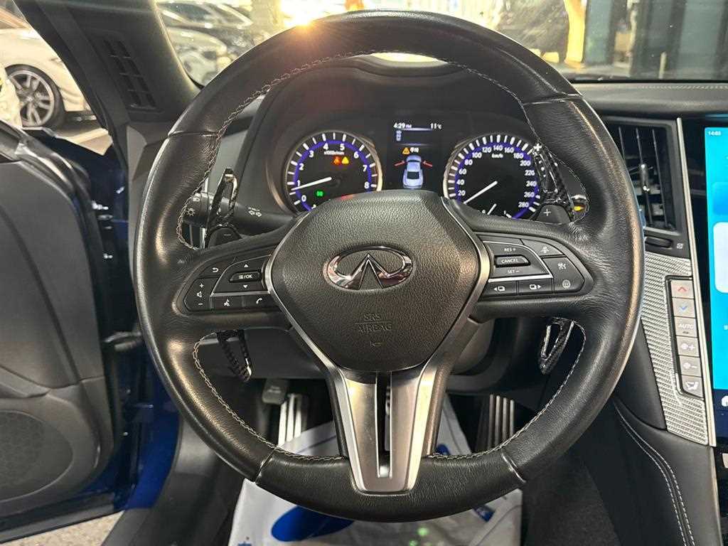 Infiniti Q60 — photo 12