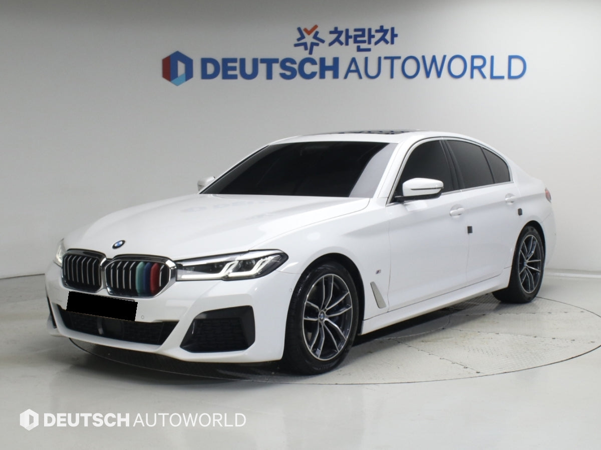 BMW 5-Series — photo 01