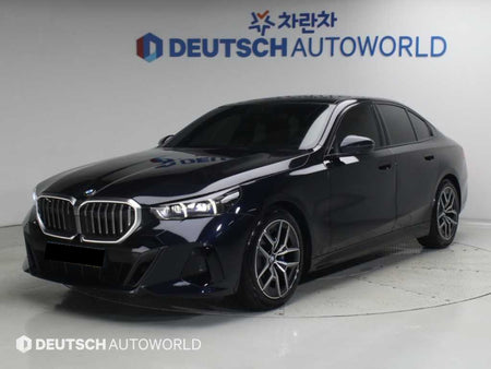 BMW 5-Series — photo 01