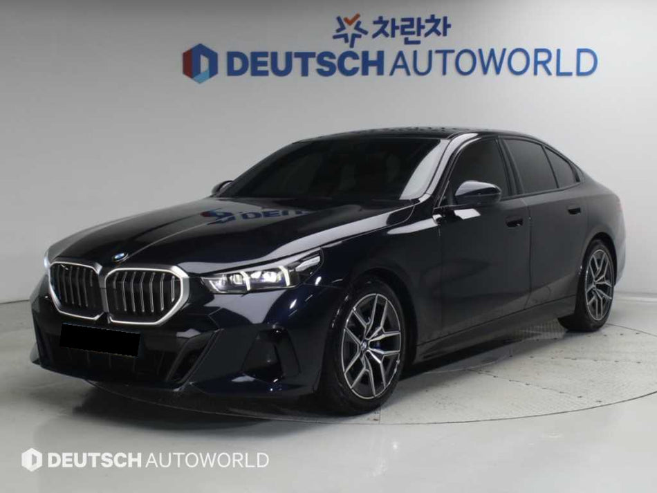 BMW 5-Series — photo 01