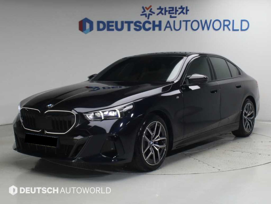 BMW 5-Series — photo 01