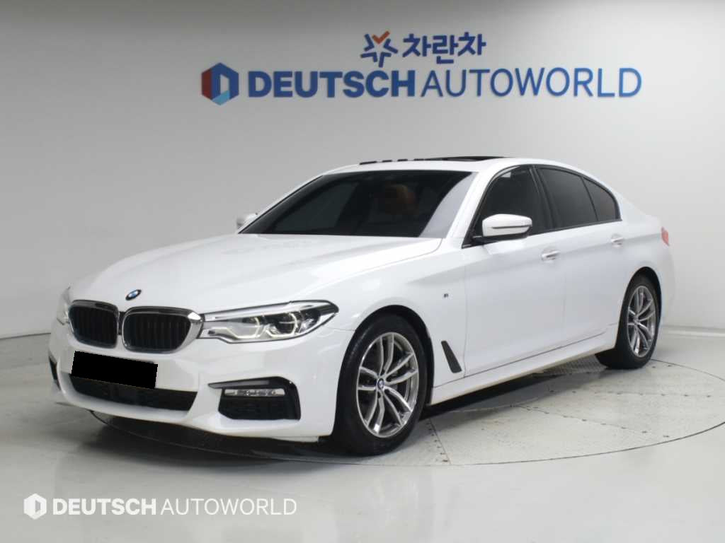 BMW 5-Series — photo 01