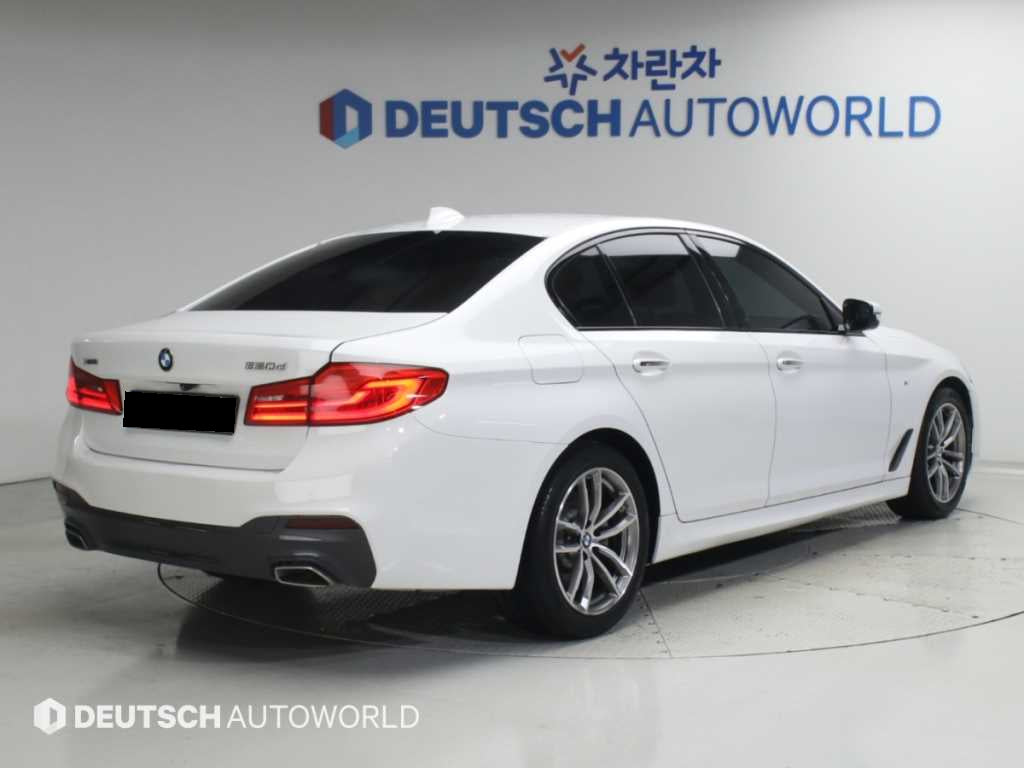 BMW 5-Series — photo 02
