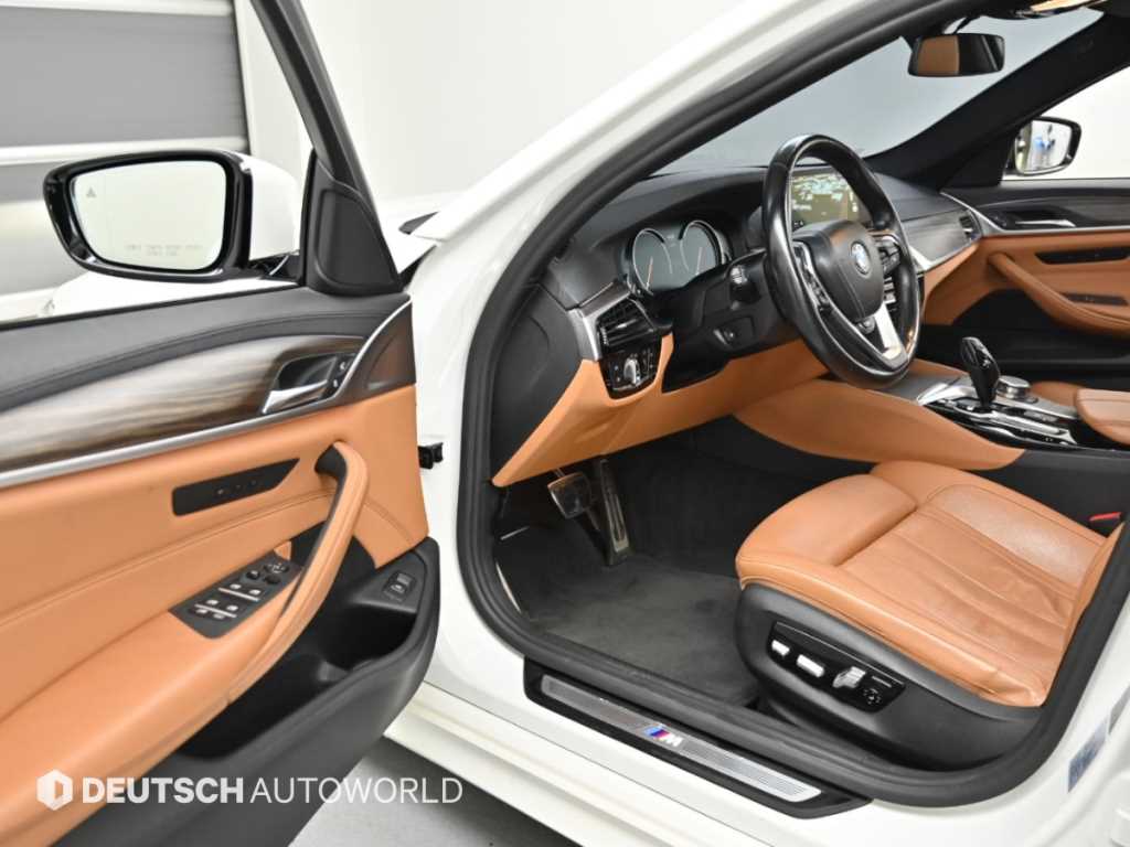 BMW 5-Series — photo 11