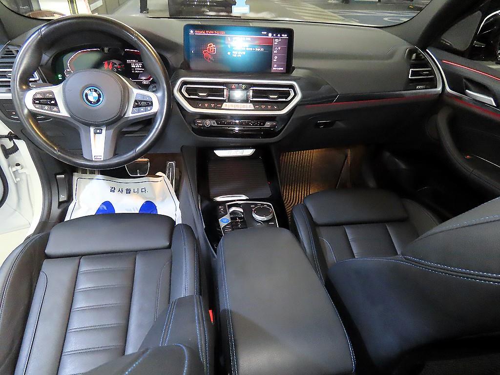 BMW iX3 — photo 10