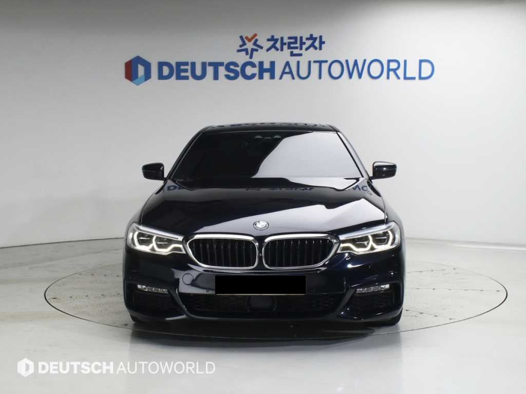 BMW 5-Series — photo 01
